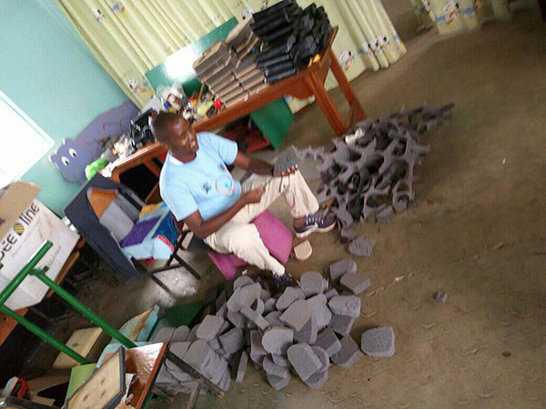 Moses making pads that will be part of supports to help children sit well in their wheelchairs. Thanks for sharing the photo today Moses, and for all you and the BethanyKids team are doing! 
